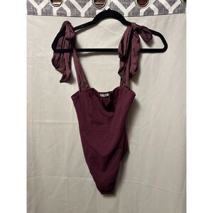 NWOT Free People Lola Thong Bodysuit In Precious Wine Size XS Bow Straps